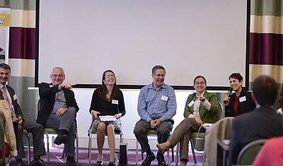 tekom Bulgaria event Michael Fritz sitting with others in a panel on stage in 2014
