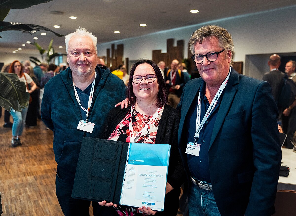 award winner Laura Katajisto standing in the middle holding her certificate with Boo Engstrand left and Steen Magnussen to her right side