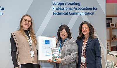 Paula Stern being honored by tekom Europe Chair and Community Manager