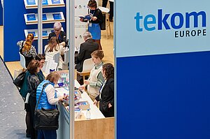 tekom staff and delegates at the tekom stand
