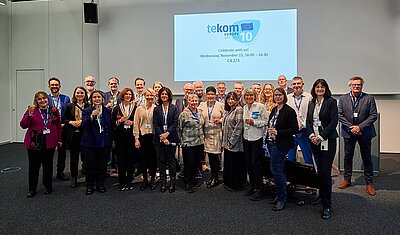 group picture of tekom Europe staff and delegates at 10th anniversary celebration in Stuttgart in 2023