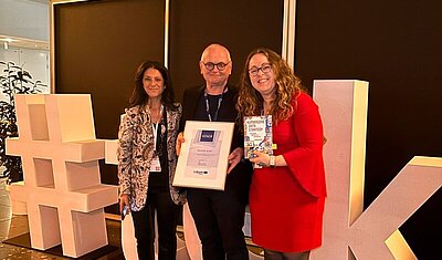 Maiken Blok being honored by tekom Europe Chair and CEO